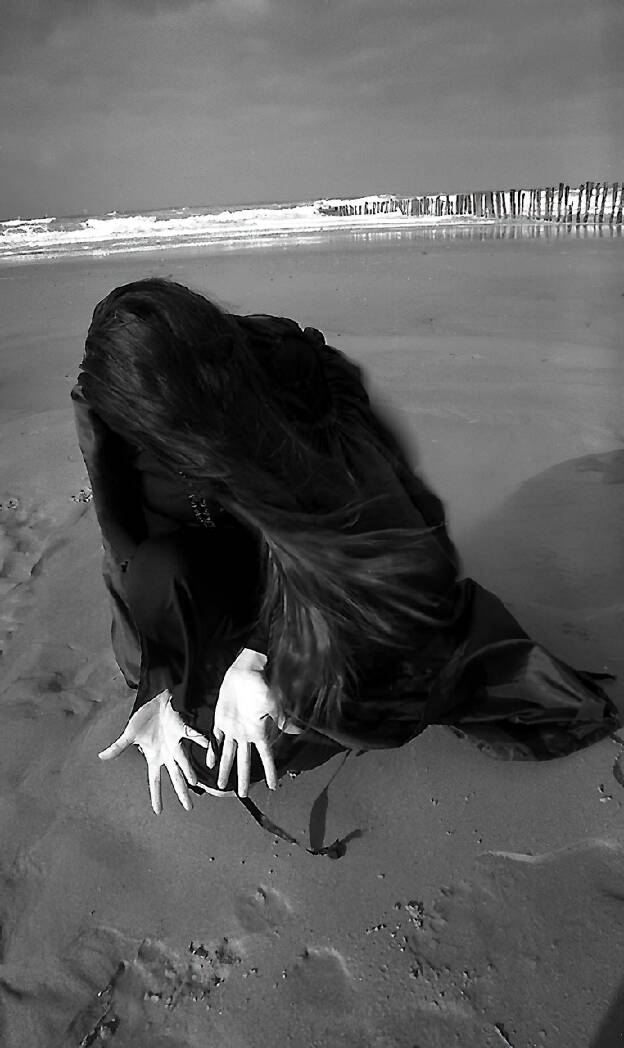 Sable et mains